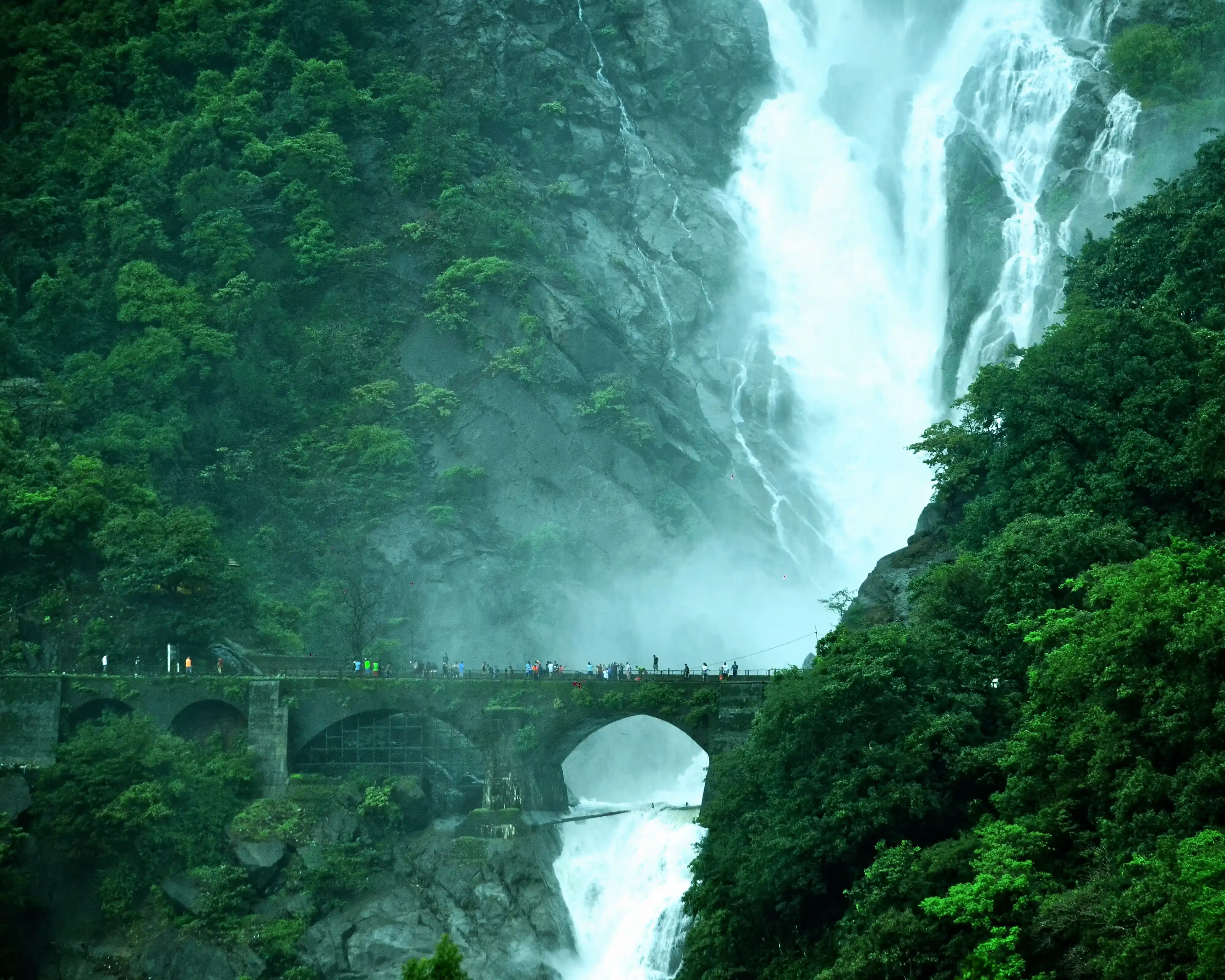 Trekkers at the base of Dudhsagar falls